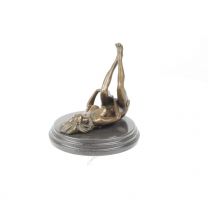 A BRONZE NAKED WOMAN ON HER BACK WITH HER LEGS UP