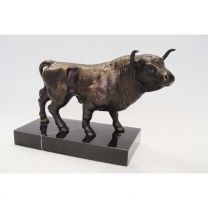 A CAST IRON SCULPTURE OF A BULL ON MARBLE BASE