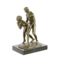 AN EROTIC BRONZE SCULPTURE OF A COUPLE MAKING LOVE